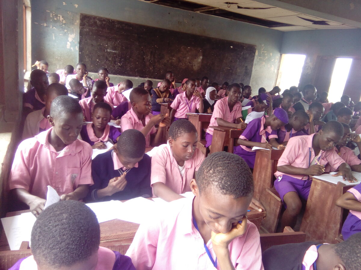 Pupils seated at proper desks after SLOSA's furniture donations